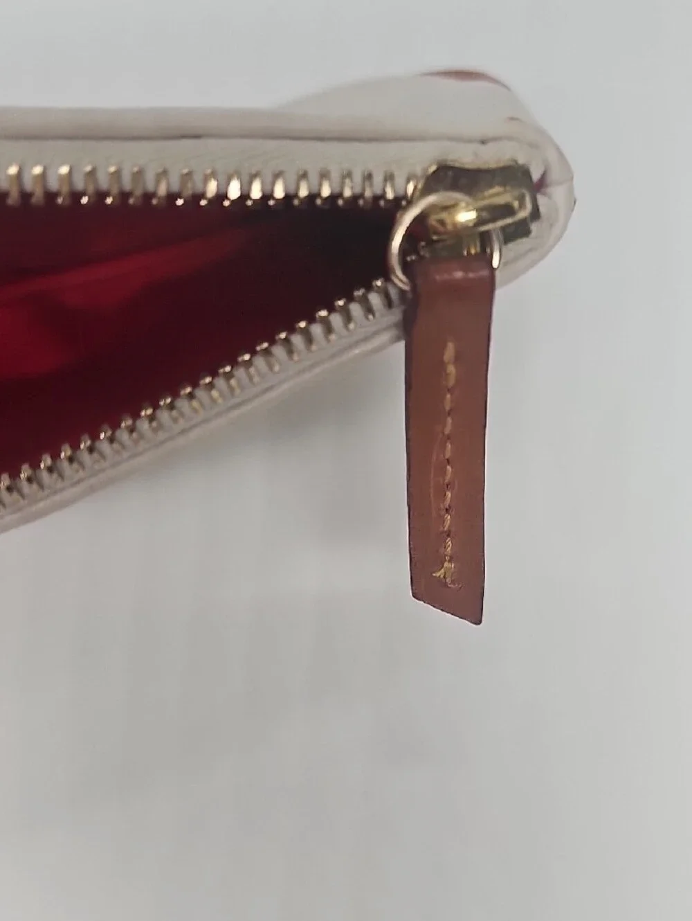 Dooney & Bourke Cream Leather Pouch